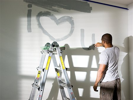 man painting a room Foto de stock - Sin royalties Premium, Código: 640-02949863