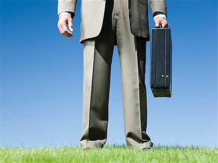 simsearch:640-08089567,k - man holding a briefcase Stock Photo - Premium Royalty-Free, Code: 640-02950410