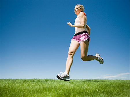 simsearch:640-02947561,k - woman jogging Stock Photo - Premium Royalty-Free, Code: 640-02950450