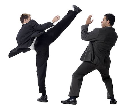 two businessmen fighting Stock Photo - Premium Royalty-Free, Code: 640-02950498