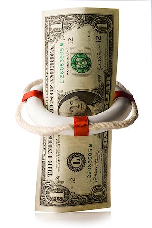 dollar in a life preserver Foto de stock - Sin royalties Premium, Código: 640-02950640