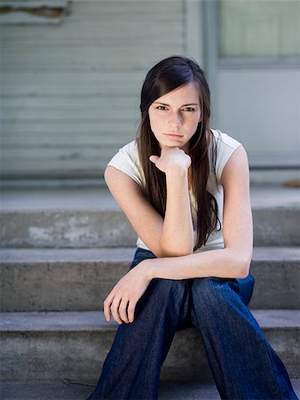 Sad brunette looking at camera young woman Stock Photos - Page 1 :  Masterfile