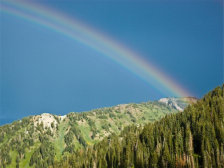 rainbow over a mountain range Stock Photo - Premium Royalty-Free, Code: 640-02950965