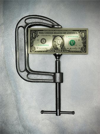 money in a clamp Foto de stock - Sin royalties Premium, Código: 640-02951007