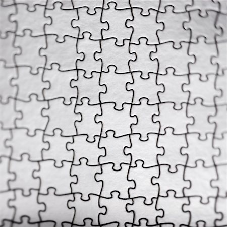 puzzles - silver puzzle Stock Photo - Premium Royalty-Free, Code: 640-02951013