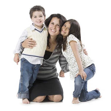 family studio shot - mother and two children Stock Photo - Premium Royalty-Free, Code: 640-02951104