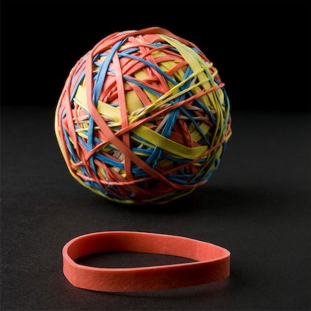 elastic - rubber band and a rubber band ball Stock Photo - Premium Royalty-Free, Code: 640-02951130