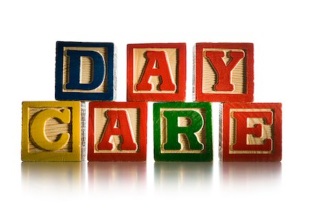 daycare - nursery blocks spelling "day care" Stock Photo - Premium Royalty-Free, Code: 640-02951202