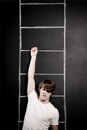 man hanging from a ladder Stock Photo - Premium Royalty-Free, Code: 640-02951238