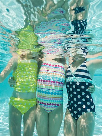 children in a swimming pool Stock Photo - Premium Royalty-Free, Code: 640-02951323