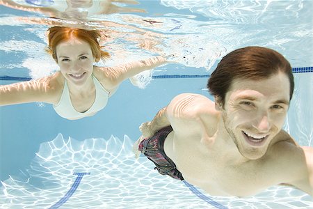 smiling women underwater - couple underwater Stock Photo - Premium Royalty-Free, Code: 640-02951399
