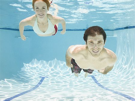 smiling women underwater - couple underwater Stock Photo - Premium Royalty-Free, Code: 640-02951400