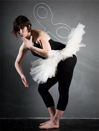 simsearch:640-02951833,k - ballerina against a blackboard Foto de stock - Royalty Free Premium, Número: 640-02951423
