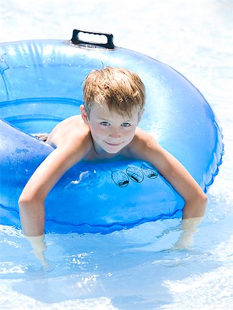 simsearch:640-02951730,k - boy in an inner tube Stock Photo - Premium Royalty-Free, Code: 640-02951473