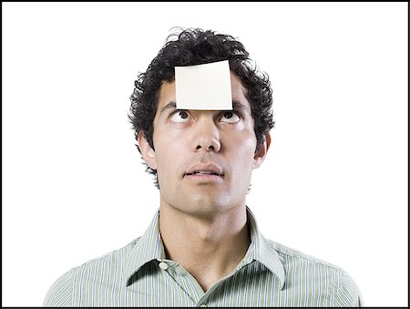 simsearch:640-02951546,k - man with a post it note on his forehead Stock Photo - Premium Royalty-Free, Code: 640-02951528