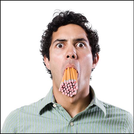 simsearch:640-02951546,k - man with a mouth full of pencils Stock Photo - Premium Royalty-Free, Code: 640-02951532