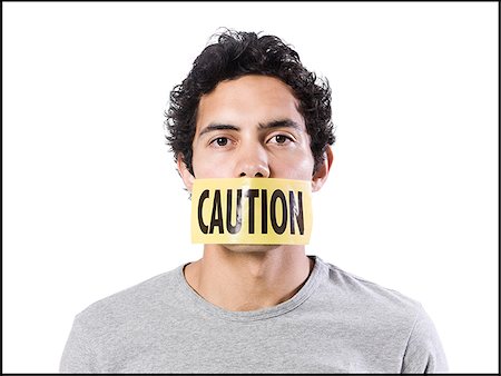 simsearch:640-02951546,k - man with caution tape over his mouth Stock Photo - Premium Royalty-Free, Code: 640-02951541