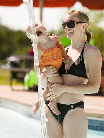 mother and daughter at a waterpark Stock Photo - Premium Royalty-Free, Code: 640-02951764