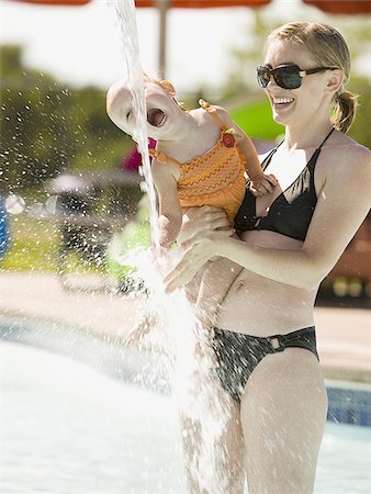 mother and daughter at a waterpark Stock Photo - Premium Royalty-Free, Code: 640-02951765