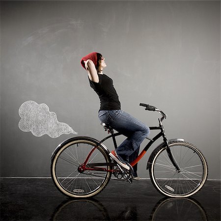 simsearch:640-02951833,k - woman on a bicycle Foto de stock - Royalty Free Premium, Número: 640-02951814