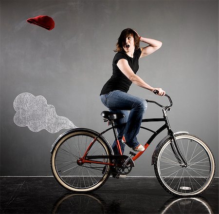 simsearch:640-03257317,k - woman on a bicycle Fotografie stock - Premium Royalty-Free, Codice: 640-02951816