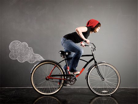 woman on a bicycle Foto de stock - Sin royalties Premium, Código: 640-02951819