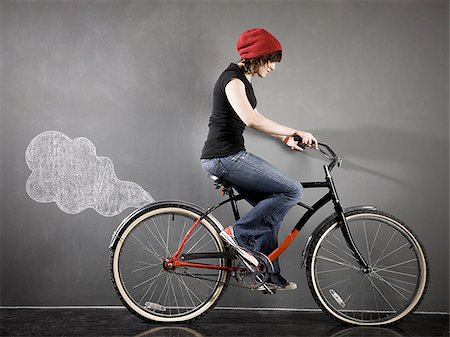 simsearch:640-02951833,k - woman on a bicycle Foto de stock - Royalty Free Premium, Número: 640-02951811