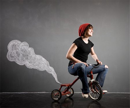 simsearch:640-02951423,k - femme sur un tricycle Photographie de stock - Premium Libres de Droits, Code: 640-02951822