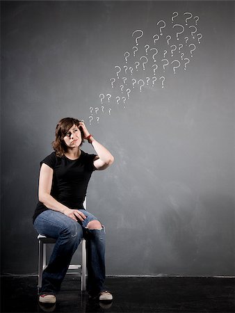 person thinking with question mark'''''''' - woman with questions Stock Photo - Premium Royalty-Free, Code: 640-02951851