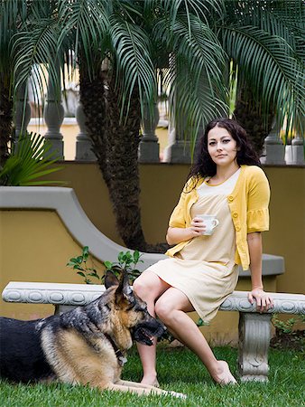 woman outdoors with her dog Stock Photo - Premium Royalty-Free, Code: 640-02951971