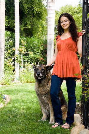 woman outdoors with her dog Stock Photo - Premium Royalty-Free, Code: 640-02951986