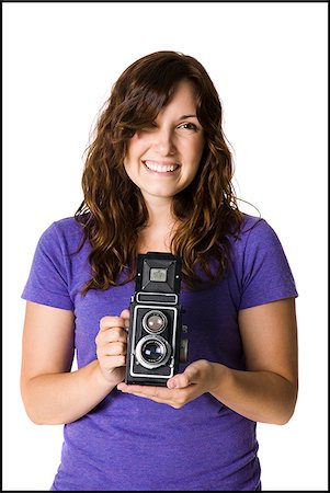 simsearch:640-03257317,k - woman holding a camera Fotografie stock - Premium Royalty-Free, Codice: 640-02952039