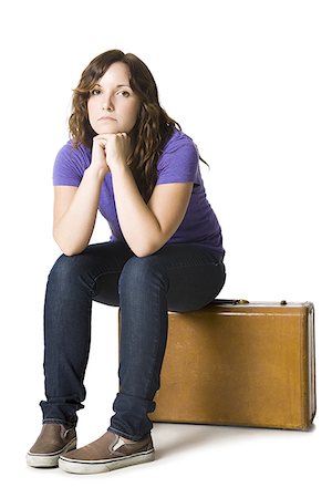 photographs of sad waiting women - woman with a suitcase Stock Photo - Premium Royalty-Free, Code: 640-02952046