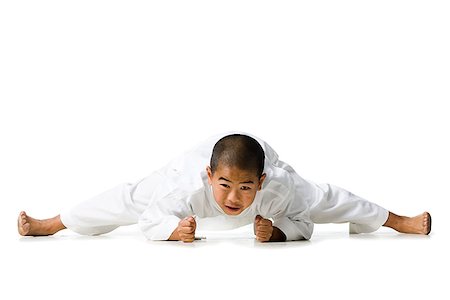 youth practicing martial arts Fotografie stock - Premium Royalty-Free, Codice: 640-02952060