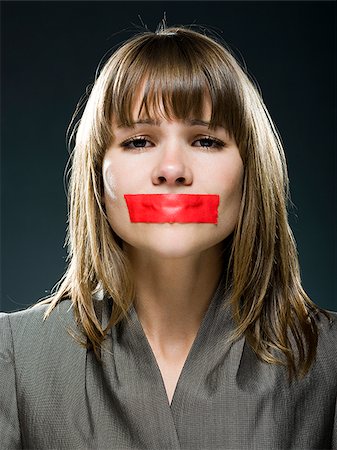 silence - businesswoman with red tape over her mouth Foto de stock - Sin royalties Premium, Código: 640-02952222