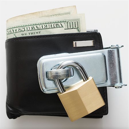 wallet with a padlock on it Foto de stock - Sin royalties Premium, Código: 640-02952315