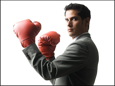 simsearch:640-02952287,k - businessman wearing boxing gloves Stock Photo - Premium Royalty-Free, Code: 640-02952316