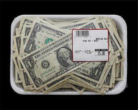 us dollars in a supermarket shrinkwrap package Stock Photo - Premium Royalty-Free, Code: 640-02952331