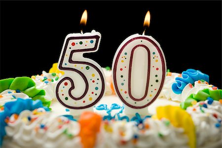 birthday cake with candles that say 50 Stock Photo - Premium Royalty-Free, Code: 640-02952361