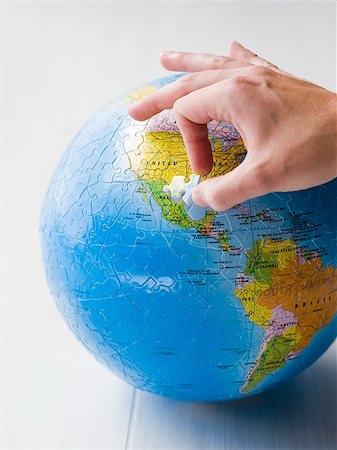 earth one hand - planet earth puzzle Stock Photo - Premium Royalty-Free, Code: 640-02952389