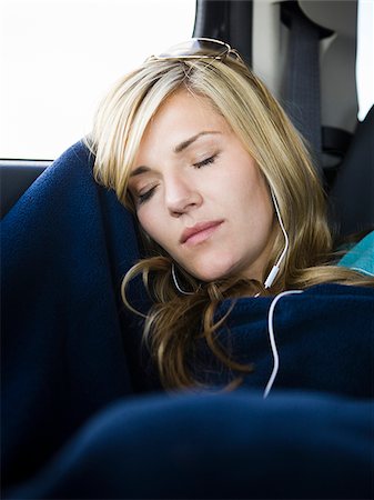 woman listening to music on a car ride Stock Photo - Premium Royalty-Free, Code: 640-02952731