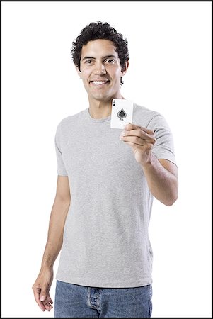 man holding an ace of spades Stock Photo - Premium Royalty-Free, Code: 640-02952993