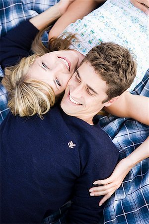 simsearch:640-02953202,k - couple lying on a blanket smiling Stock Photo - Premium Royalty-Free, Code: 640-02953026