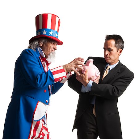 uncle same stealing a man's piggy bank Stock Photo - Premium Royalty-Free, Code: 640-02953153