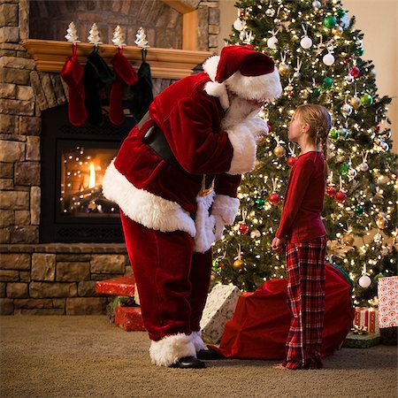 santa profile - santa claus and a girl talking Stock Photo - Premium Royalty-Free, Code: 640-02953174