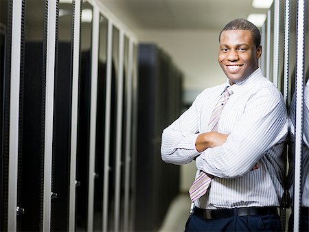 businessman in a server room Stock Photo - Premium Royalty-Free, Code: 640-02953249