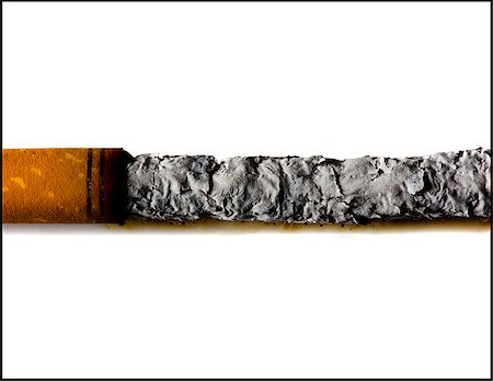 smoked cigarette Stock Photo - Premium Royalty-Free, Code: 640-02953299