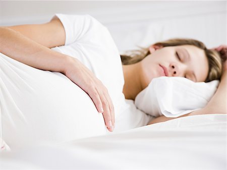 simsearch:640-02953250,k - pregnant woman sleeping Stock Photo - Premium Royalty-Free, Code: 640-02953313