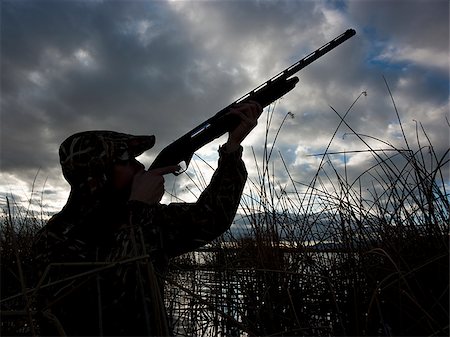 man out hunting Stock Photo - Premium Royalty-Free, Code: 640-02953350