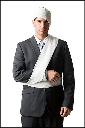 simsearch:640-02953491,k - businessman with bandages on Stock Photo - Premium Royalty-Free, Code: 640-02953404
